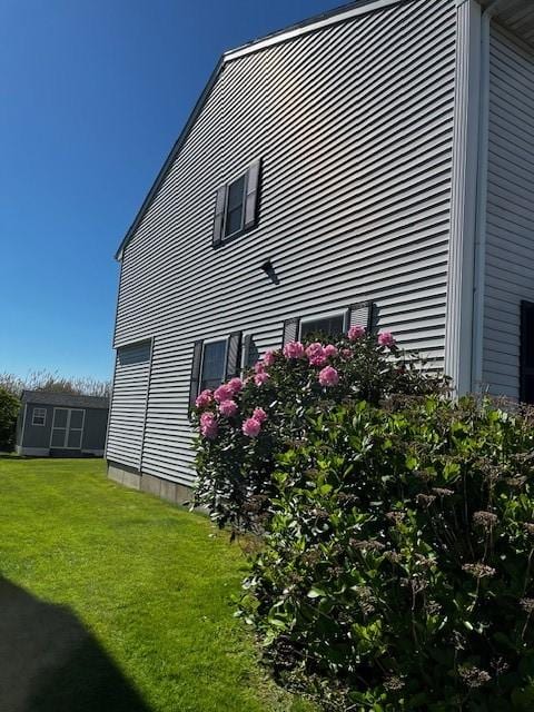 16 Elm Ave, Narragansett, RI 02882 - view of side of home with a yard