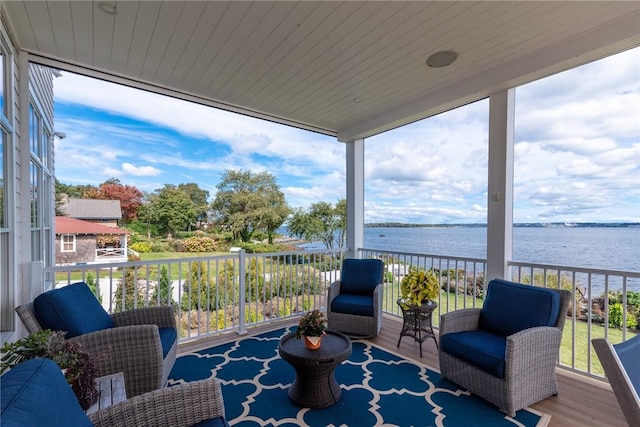 exterior space with a water view