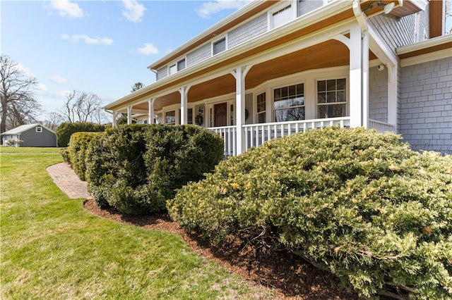 200 Pond St, South Kingstown, RI 02879 - view of side of home with a porch and a lawn