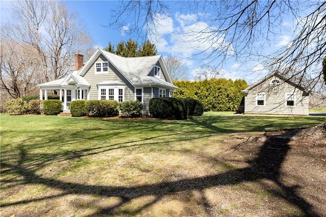 200 Pond St, South Kingstown, RI 02879 - view of property exterior with a lawn and a chimney