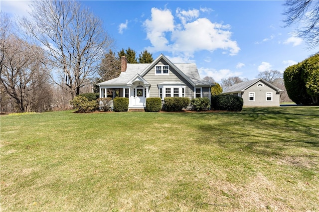 200 Pond St, South Kingstown, RI 02879 - view of front of property with a front yard and a chimney