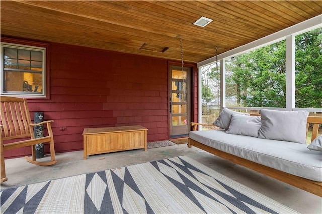 sunroom / solarium featuring outdoor lounge area
