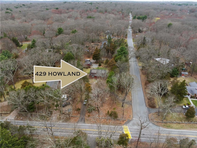 bird's eye view featuring a view of trees