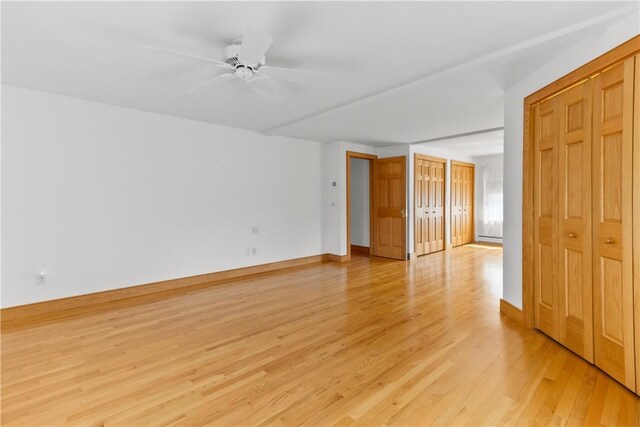200 Pond St, South Kingstown, RI 02879 - empty room featuring ceiling fan, light wood finished floors, and baseboards