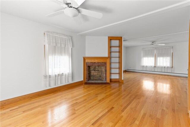 200 Pond St, South Kingstown, RI 02879 - unfurnished living room with ceiling fan, a fireplace, wood finished floors, a baseboard radiator, and baseboards