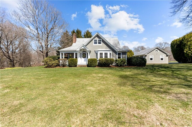 200 Pond St, South Kingstown, RI 02879 - view of front of property featuring a front lawn and a chimney