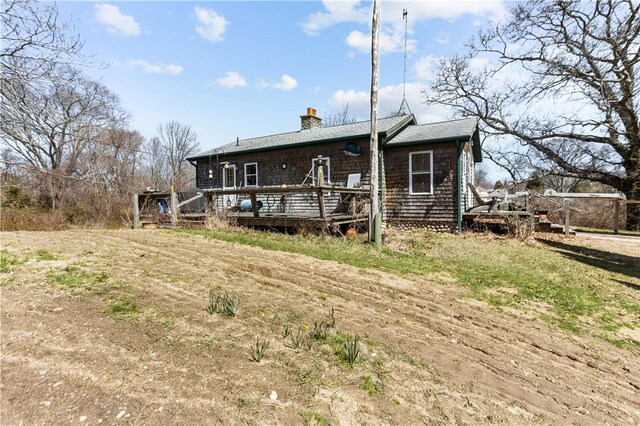 200 Pond St, South Kingstown, RI 02879 - back of property featuring a deck and a chimney