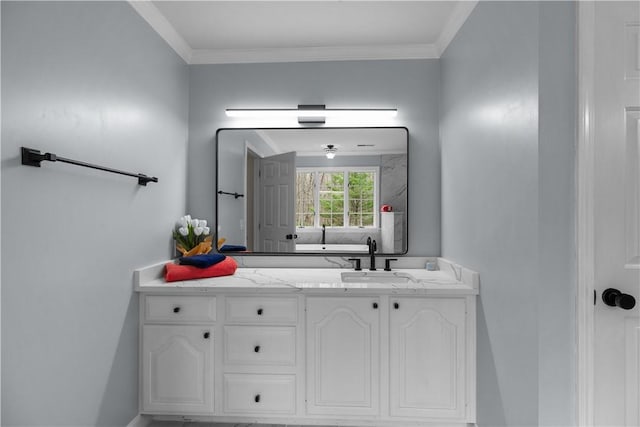 bathroom with vanity and ornamental molding