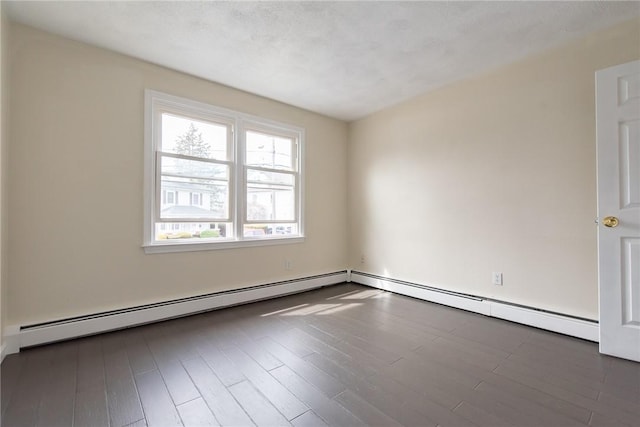 83 Wyndham Ave, Providence, RI 02908 - empty room featuring baseboard heating and wood finished floors