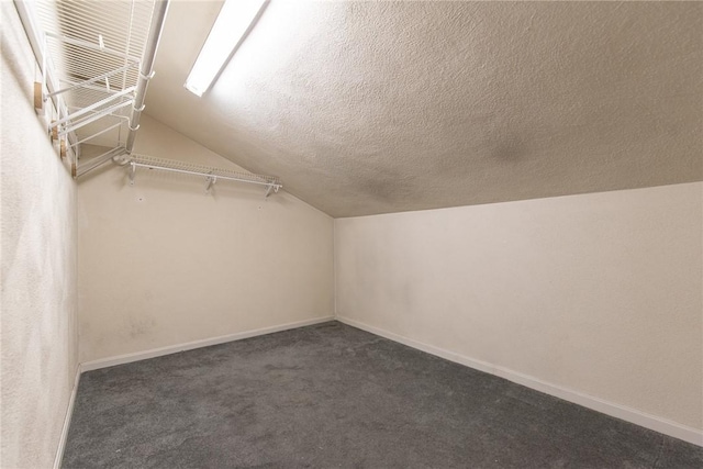 83 Wyndham Ave, Providence, RI 02908 - spacious closet featuring lofted ceiling and carpet floors