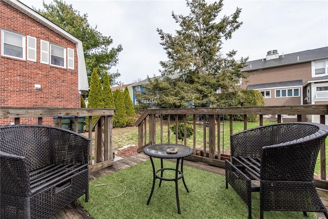 83 Wyndham Ave, Providence, RI 02908 - view of wooden balcony with a wooden deck