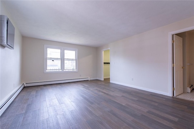 83 Wyndham Ave, Providence, RI 02908 - spare room with dark wood-type flooring, baseboards, and baseboard heating