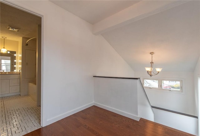 83 Wyndham Ave, Providence, RI 02908 - interior space with a chandelier, vaulted ceiling with beams, and a healthy amount of sunlight
