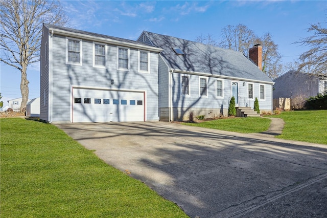 view of front facade featuring an attached garage, a chimney, driveway, and a front lawn