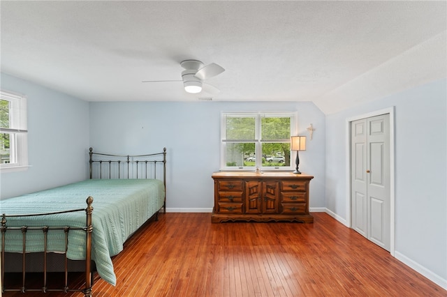 133 Old Pine Rd, Narragansett, RI 02882 - bedroom with wood-type flooring, baseboards, ceiling fan, and a closet