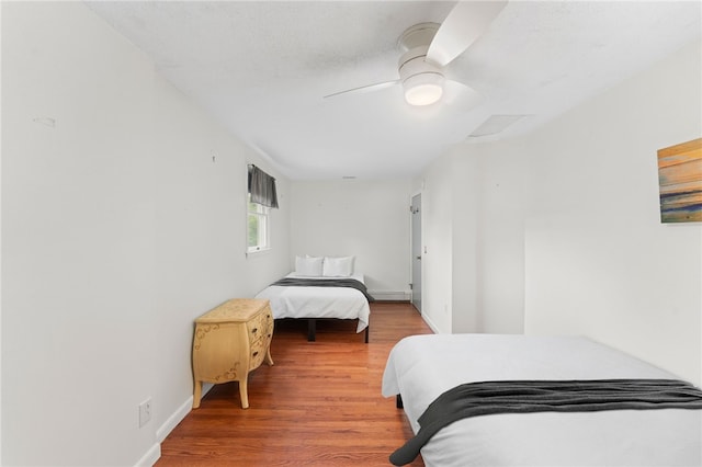 133 Old Pine Rd, Narragansett, RI 02882 - bedroom with wood finished floors, ceiling fan, and baseboards