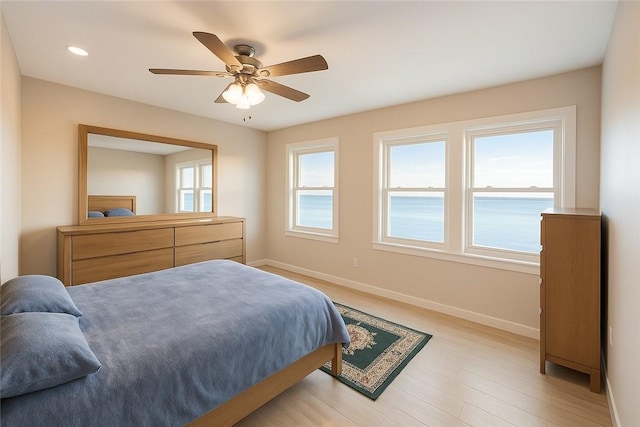 bedroom featuring light wood-style flooring, ceiling fan, baseboards, and recessed lighting