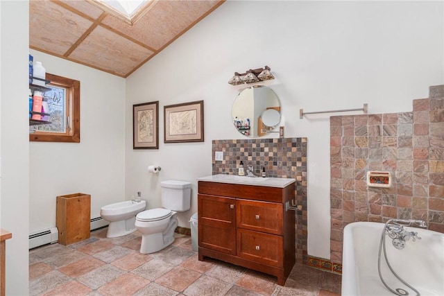 bathroom with toilet, a tub, a bidet, and a baseboard heating unit