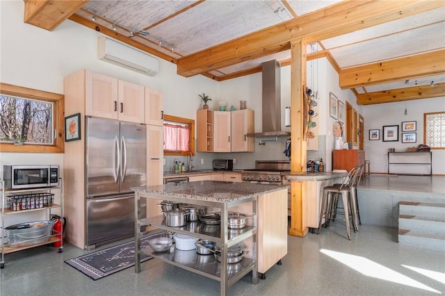 kitchen with open shelves, island range hood, appliances with stainless steel finishes, and a wall unit AC