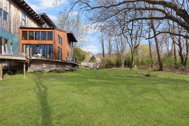 view of yard with a deck