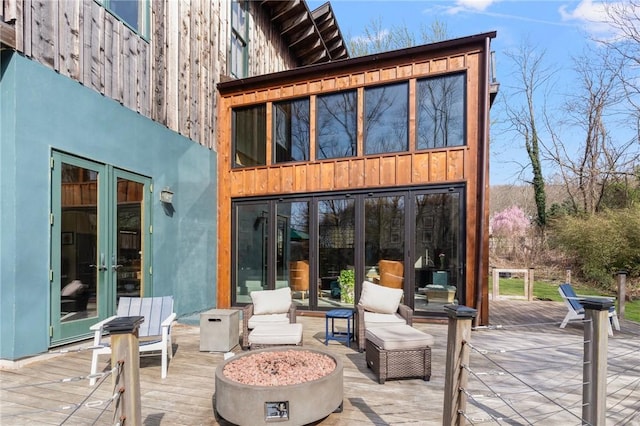view of patio featuring a deck and french doors