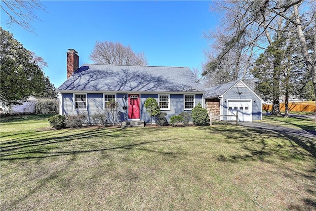 view of front of property featuring a front lawn, fence, aphalt driveway, and a chimney