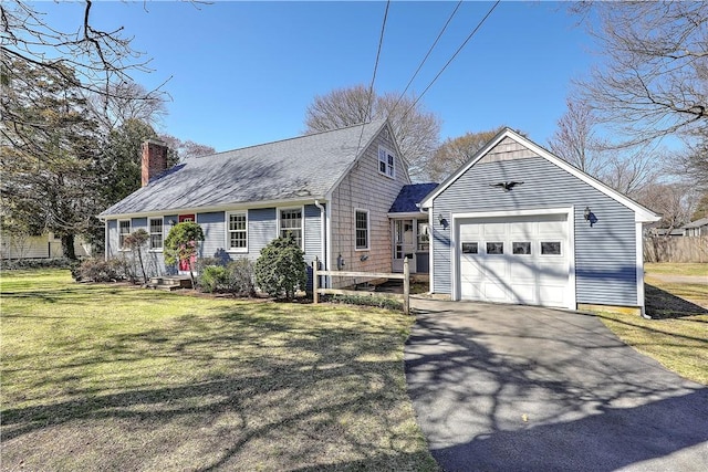 view of front facade with a chimney, aphalt driveway, and a front lawn