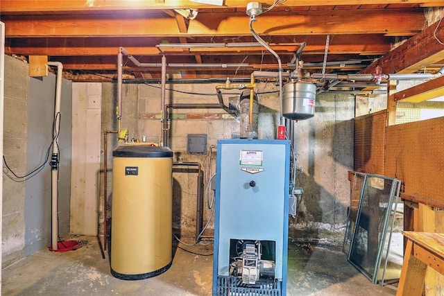 utility room with water heater and a heating unit