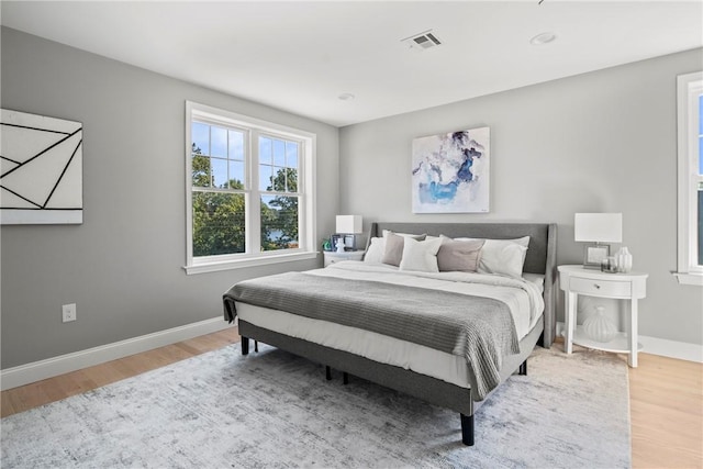 0 Greenwich Blvd Unit 102, East Greenwich, RI 02818 - bedroom with light wood-style flooring and baseboards
