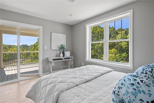 0 Greenwich Blvd Unit 102, East Greenwich, RI 02818 - bedroom with access to exterior and wood finished floors