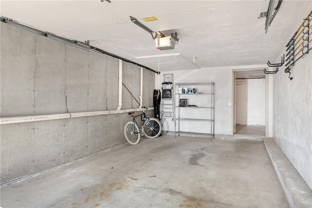 garage featuring a garage door opener