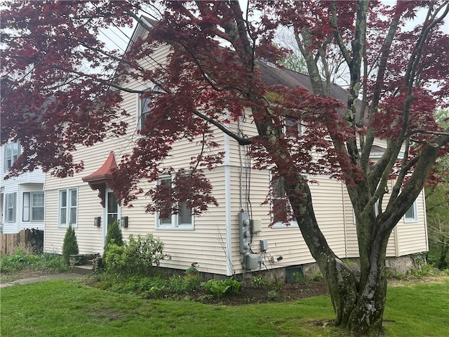 196 Columbia St, South Kingstown, RI 02879 - view of side of property featuring a lawn
