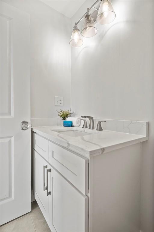0 Greenwich Blvd Unit 110, East Greenwich, RI 02818 - bathroom featuring vanity and tile patterned flooring
