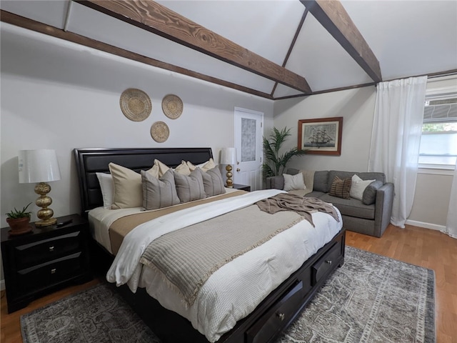 33 Almy St, Newport, RI 02840 - bedroom with wood finished floors and lofted ceiling with beams