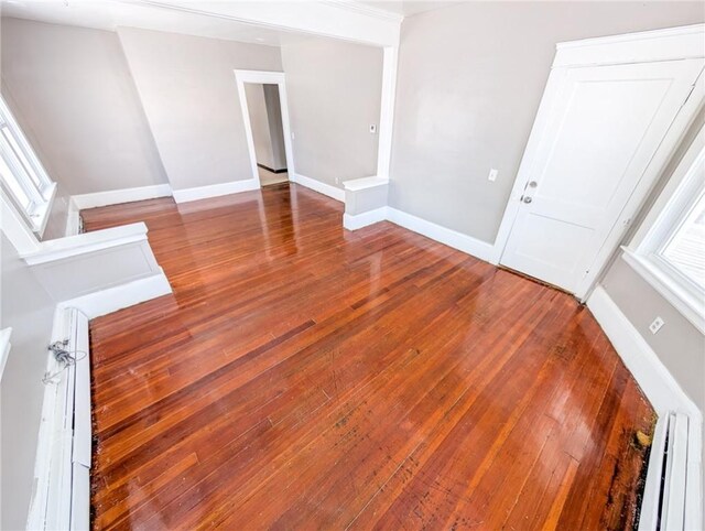 17 Marietta St, Providence, RI 02904 - unfurnished room with a baseboard radiator, hardwood / wood-style floors, and baseboards