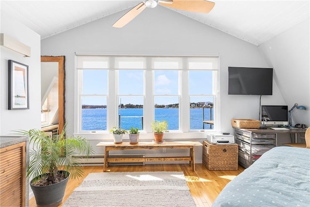 1597 Main Rd, Tiverton, RI 02878 - bedroom featuring a baseboard heating unit, ceiling fan, lofted ceiling, and wood finished floors