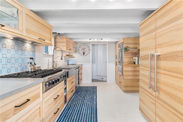 1597 Main Rd, Tiverton, RI 02878 - kitchen with light brown cabinets, a sink, beam ceiling, tasteful backsplash, and appliances with stainless steel finishes