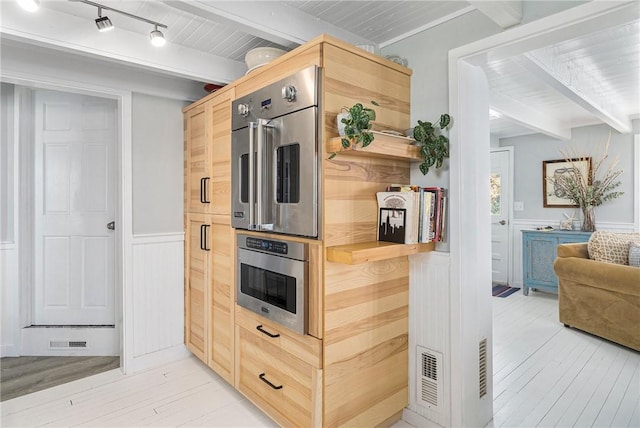 1597 Main Rd, Tiverton, RI 02878 - kitchen featuring a wainscoted wall, open shelves, light brown cabinets, light wood-type flooring, and beam ceiling