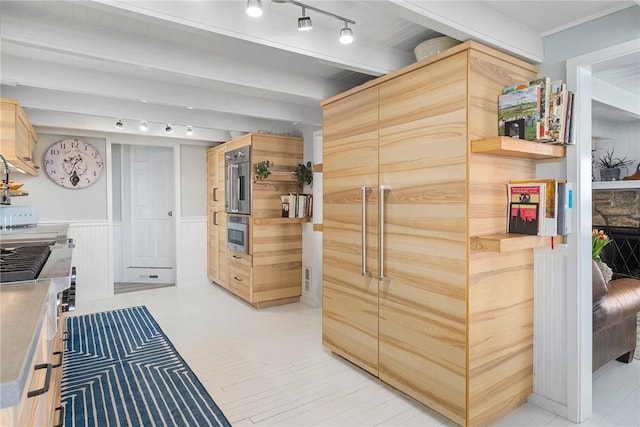 1597 Main Rd, Tiverton, RI 02878 - interior space with a wainscoted wall, beam ceiling, and rail lighting