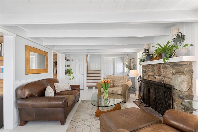 1597 Main Rd, Tiverton, RI 02878 - living area featuring stairs, beamed ceiling, and a fireplace
