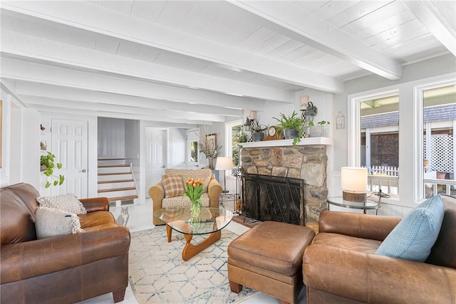 1597 Main Rd, Tiverton, RI 02878 - living room with a stone fireplace, beam ceiling, stairs, and wood ceiling
