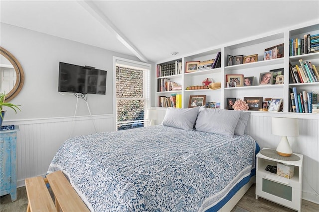 1597 Main Rd, Tiverton, RI 02878 - bedroom featuring wainscoting, lofted ceiling, and wood finished floors