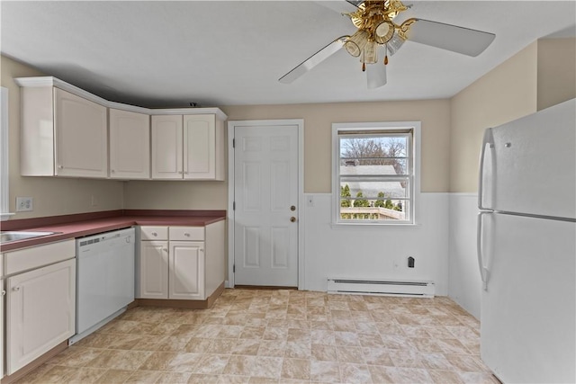 345 Post Rd, Warwick, RI 02888 - kitchen featuring a baseboard heating unit, white appliances, white cabinetry, a ceiling fan, and dark countertops