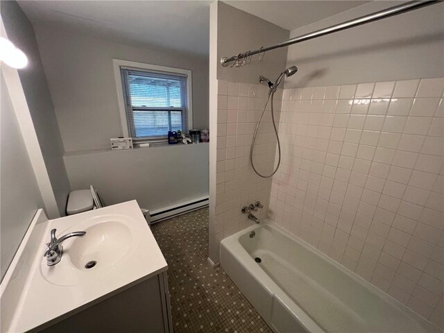345 Post Rd, Warwick, RI 02888 - bathroom with vanity, tile patterned flooring, toilet, a baseboard radiator, and tub / shower combination