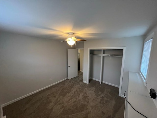 345 Post Rd, Warwick, RI 02888 - unfurnished bedroom with a closet, baseboards, a ceiling fan, and carpet