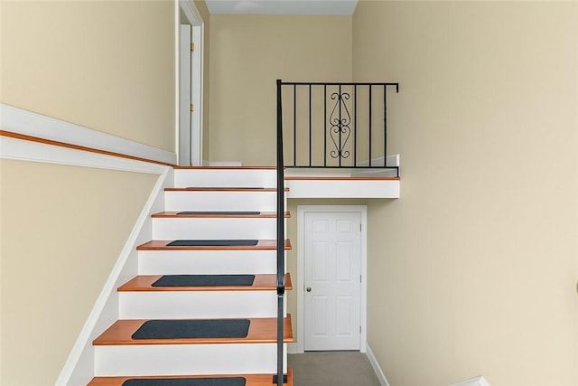 345 Post Rd, Warwick, RI 02888 - stairway featuring baseboards