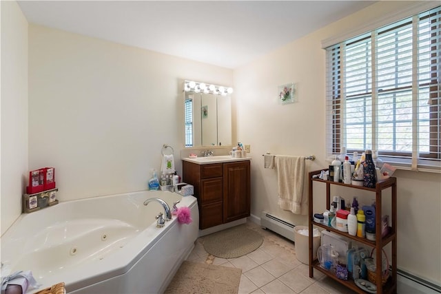 bathroom featuring plenty of natural light, baseboard heating, tile patterned flooring, and a tub with jets
