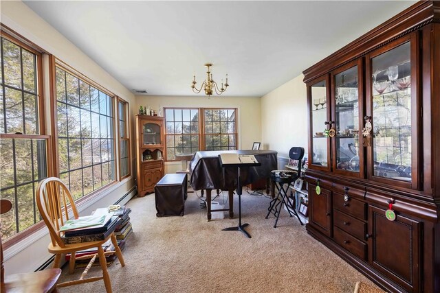 interior space with light carpet, a wealth of natural light, visible vents, and a chandelier