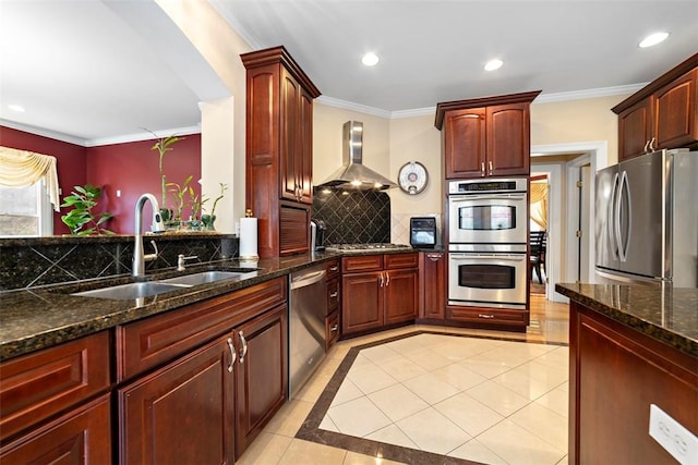 174 Windmill Dr, South Kingstown, RI 02879 - kitchen with a sink, stainless steel appliances, wall chimney exhaust hood, and reddish brown cabinets