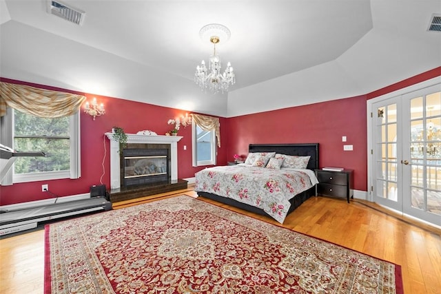 174 Windmill Dr, South Kingstown, RI 02879 - bedroom featuring visible vents, wood finished floors, and multiple windows